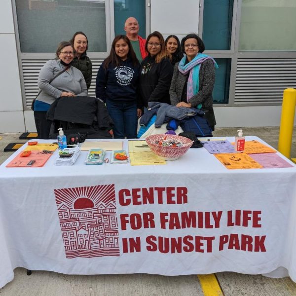 CFLSP Staff and Board Member Peter Meiland at a Resource Fair for Asylum Seekers Held at the Glo Hotel Family Shelter